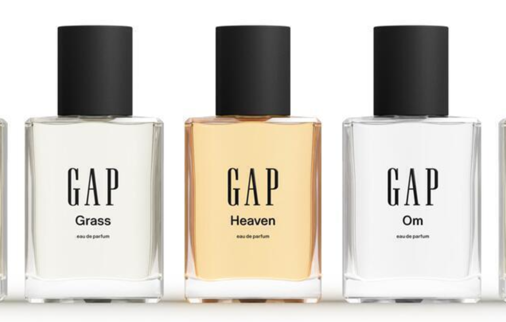 Gap Grass, Heaven and Om eau de parfum bottles lined up against a white background.